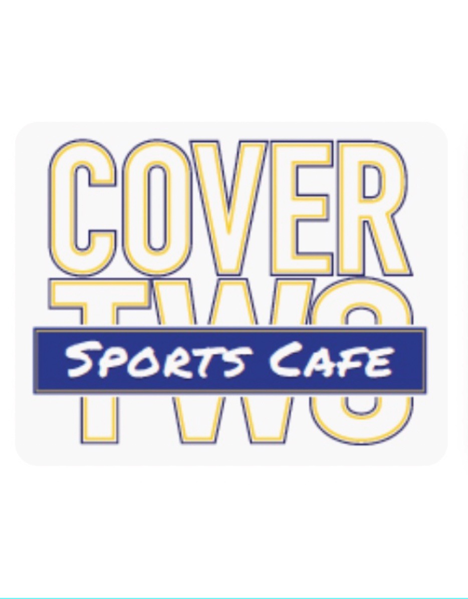 Logo for Cover Two Sports Cafe with bold yellow outlined lettering on a white background.