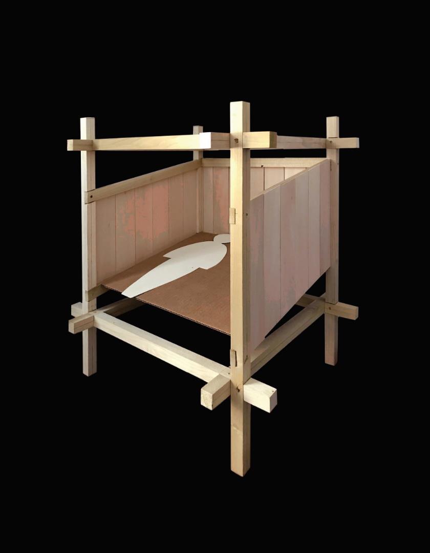 A photo of a wooden architectural model