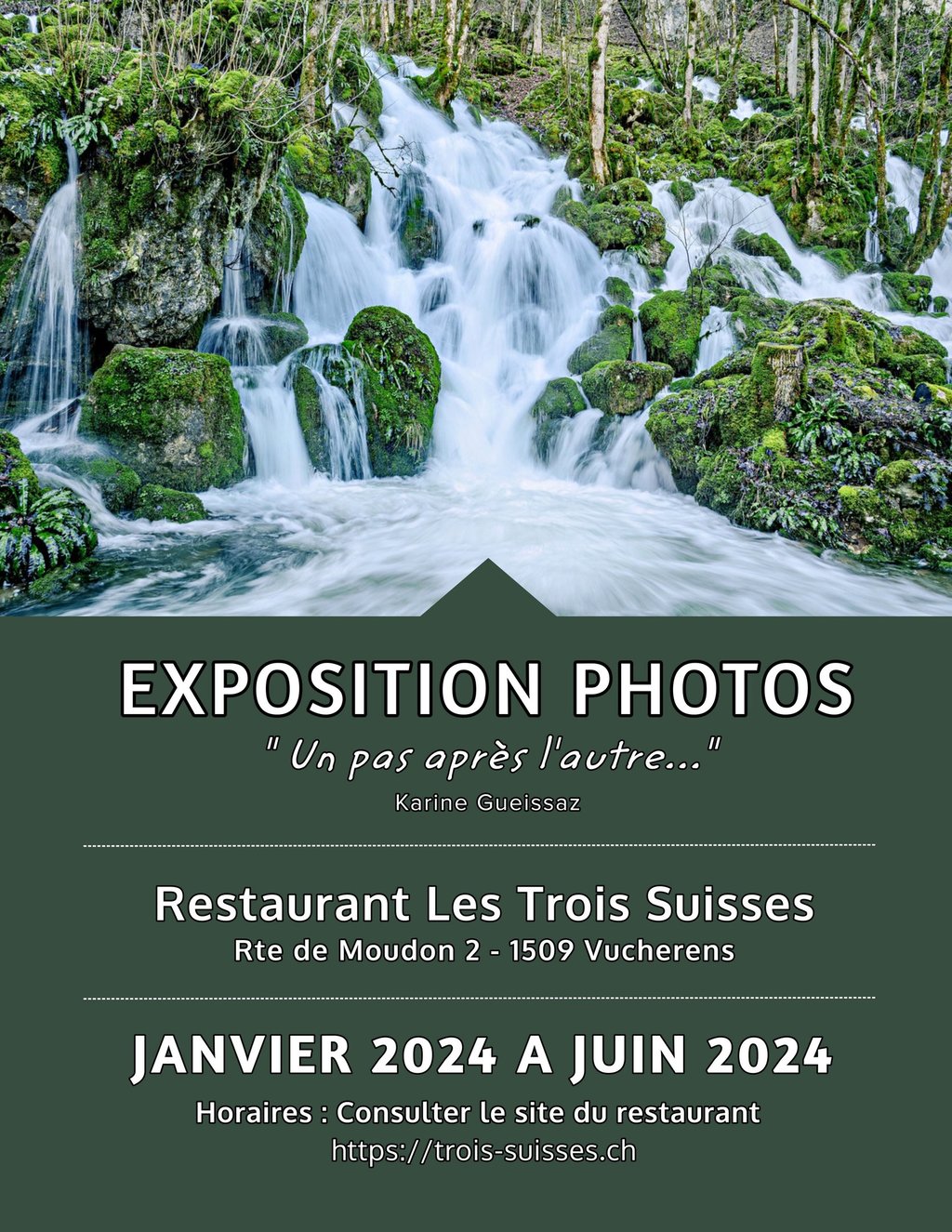 a waterfall in the middle of a forest