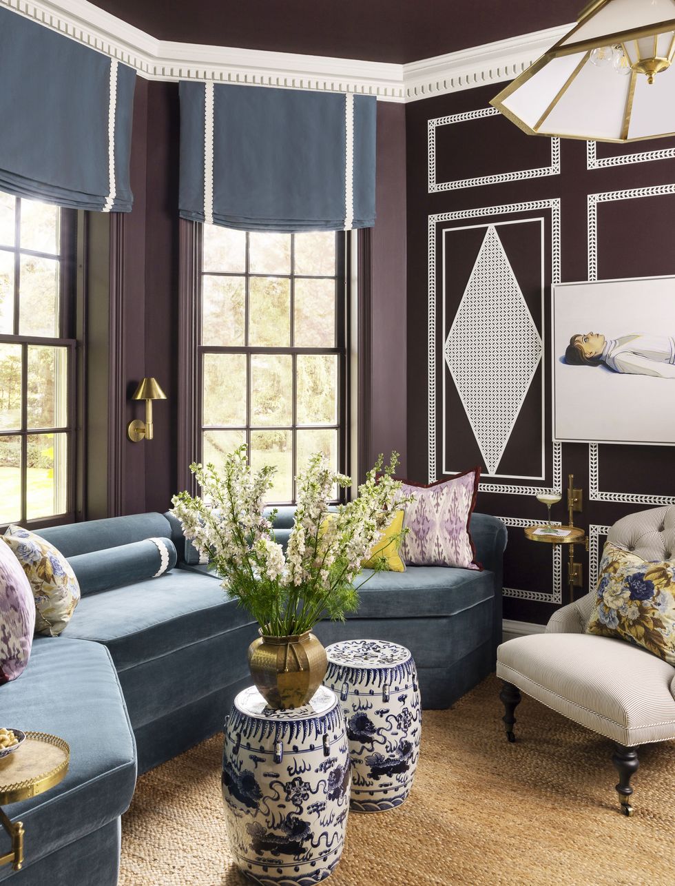 a living room with a couch and a chair