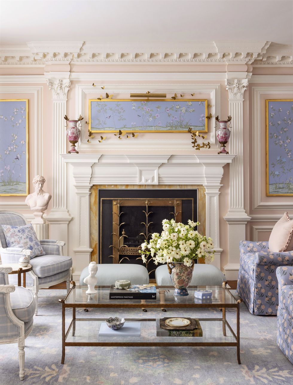 a living room with a fireplace and a fireplace