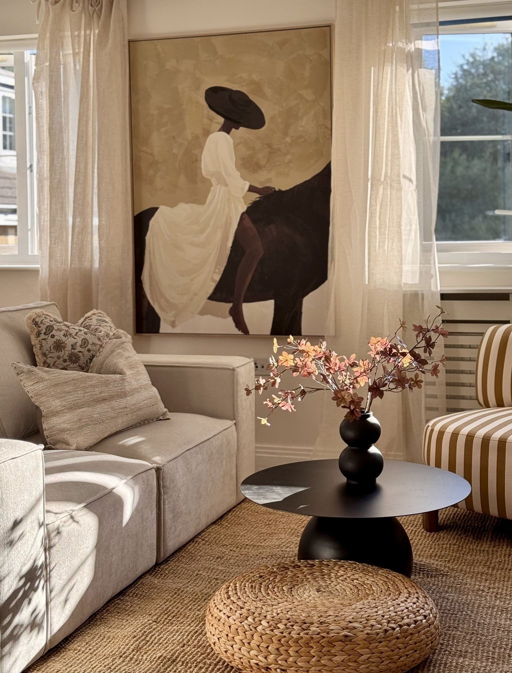 Professionally staged living room with furniture and soft furnishings in a vacant property
