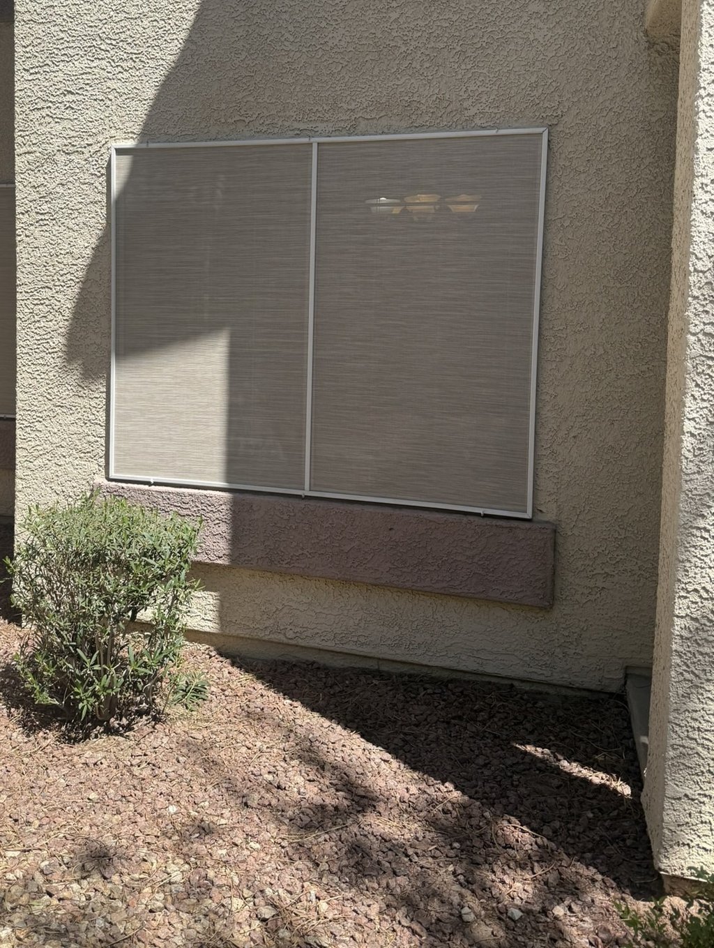 Solar screen mesh replaced on large window.