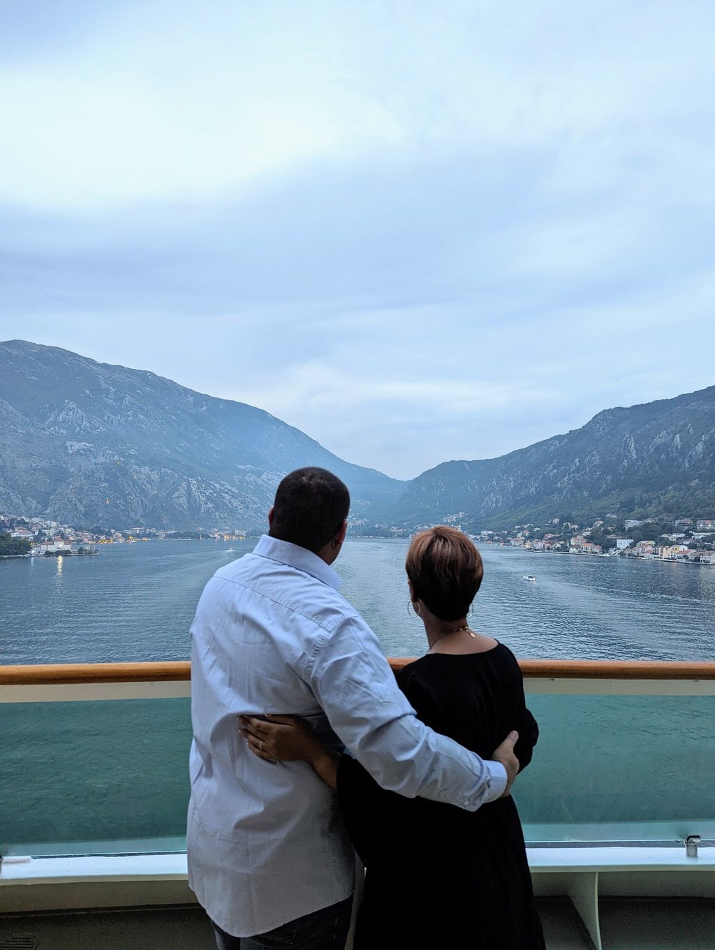 My wife and I on the back of a boat in the bay of Kotar, Montenegro