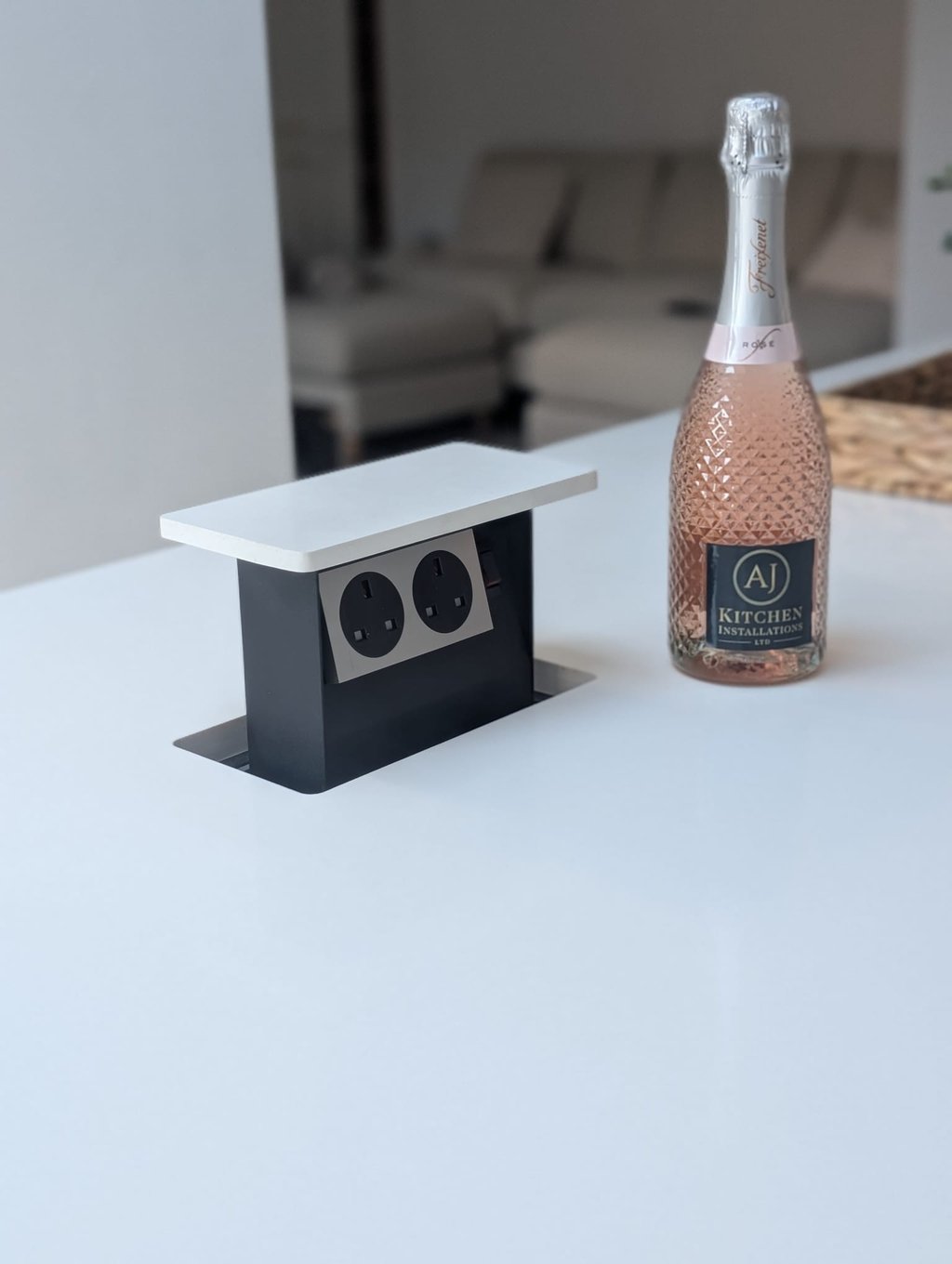 popup kitchen outlets, with pink champagne next to it
