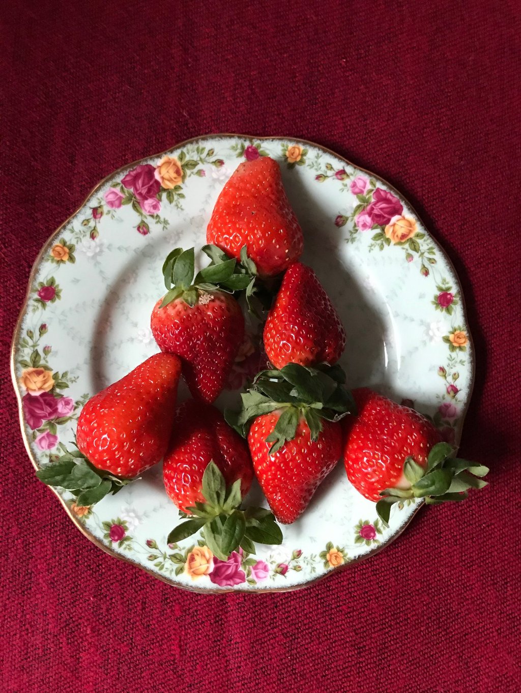 a plate of strawberries