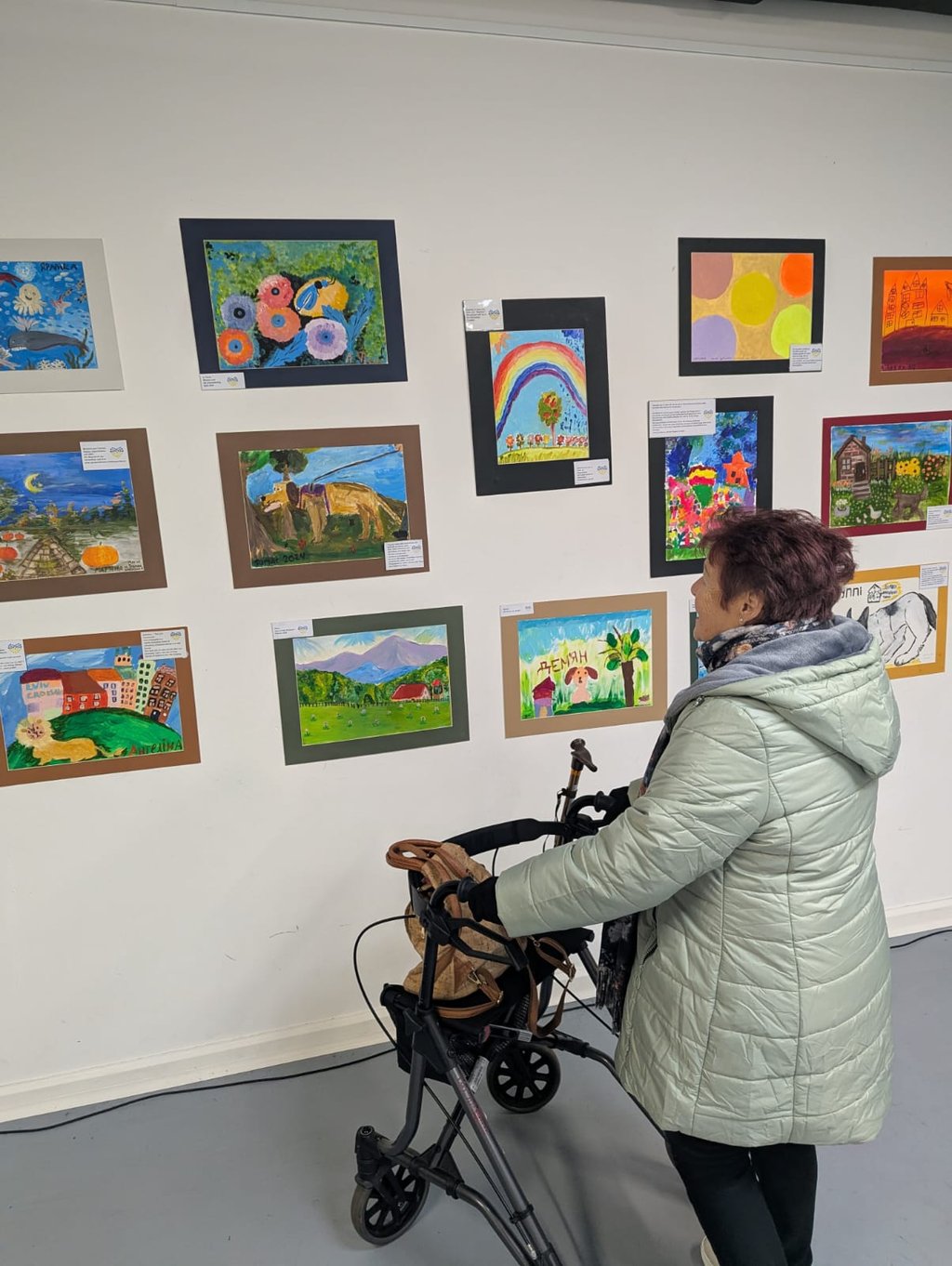 person looking at the artwork