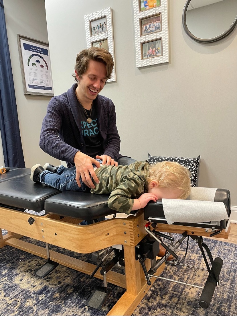 Child sleeps during their pediatric chiropractic adjustment in Franklin TN