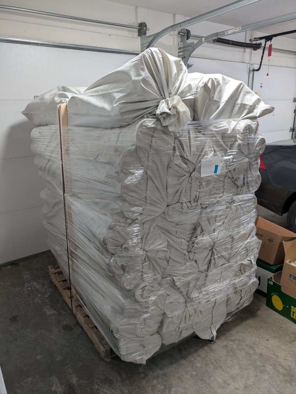 A massive stack of tree tubes over 6 feet tall