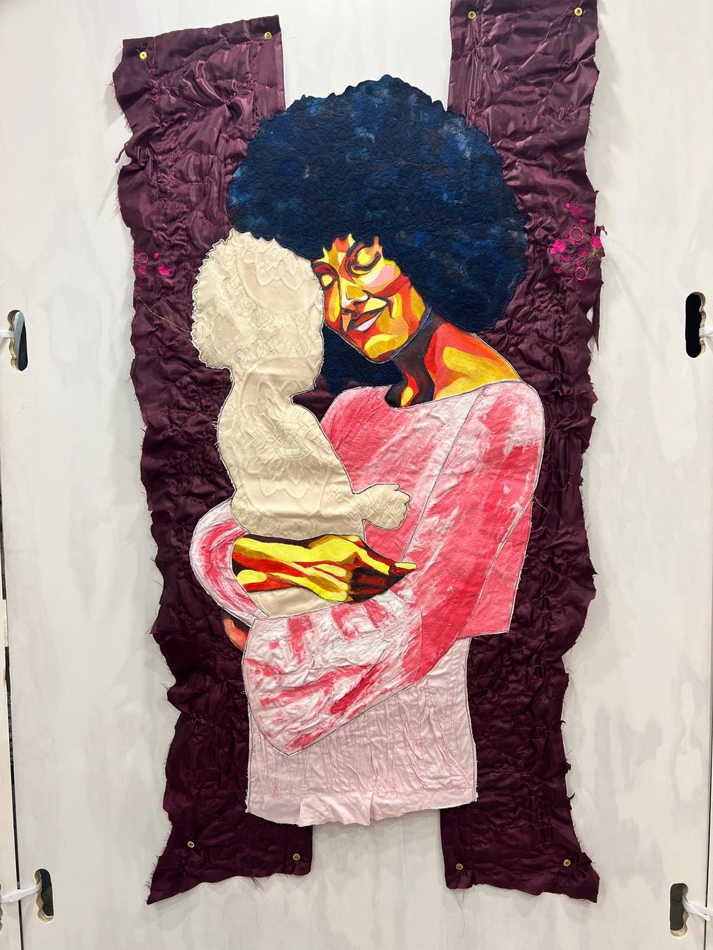 a painting of a woman with a baby in her arms