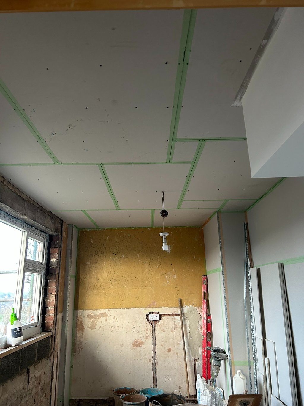 New higher window, fireplace removed, new electrics. Ready to Plaster!