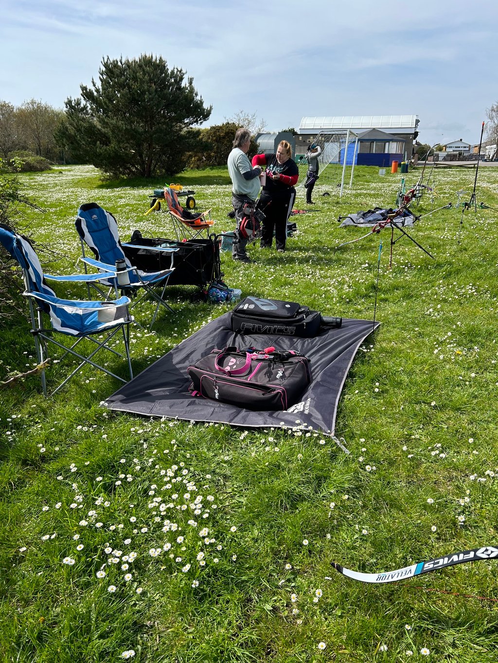 a group of archers getting ready to start shooting