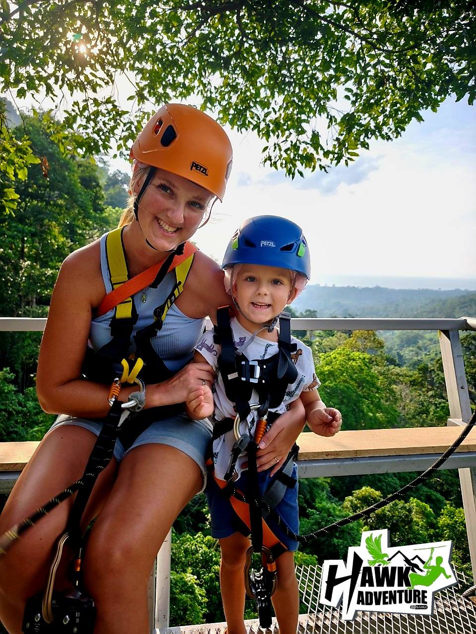 a woman and a child on a zipline hawk adventure koh samui zipline