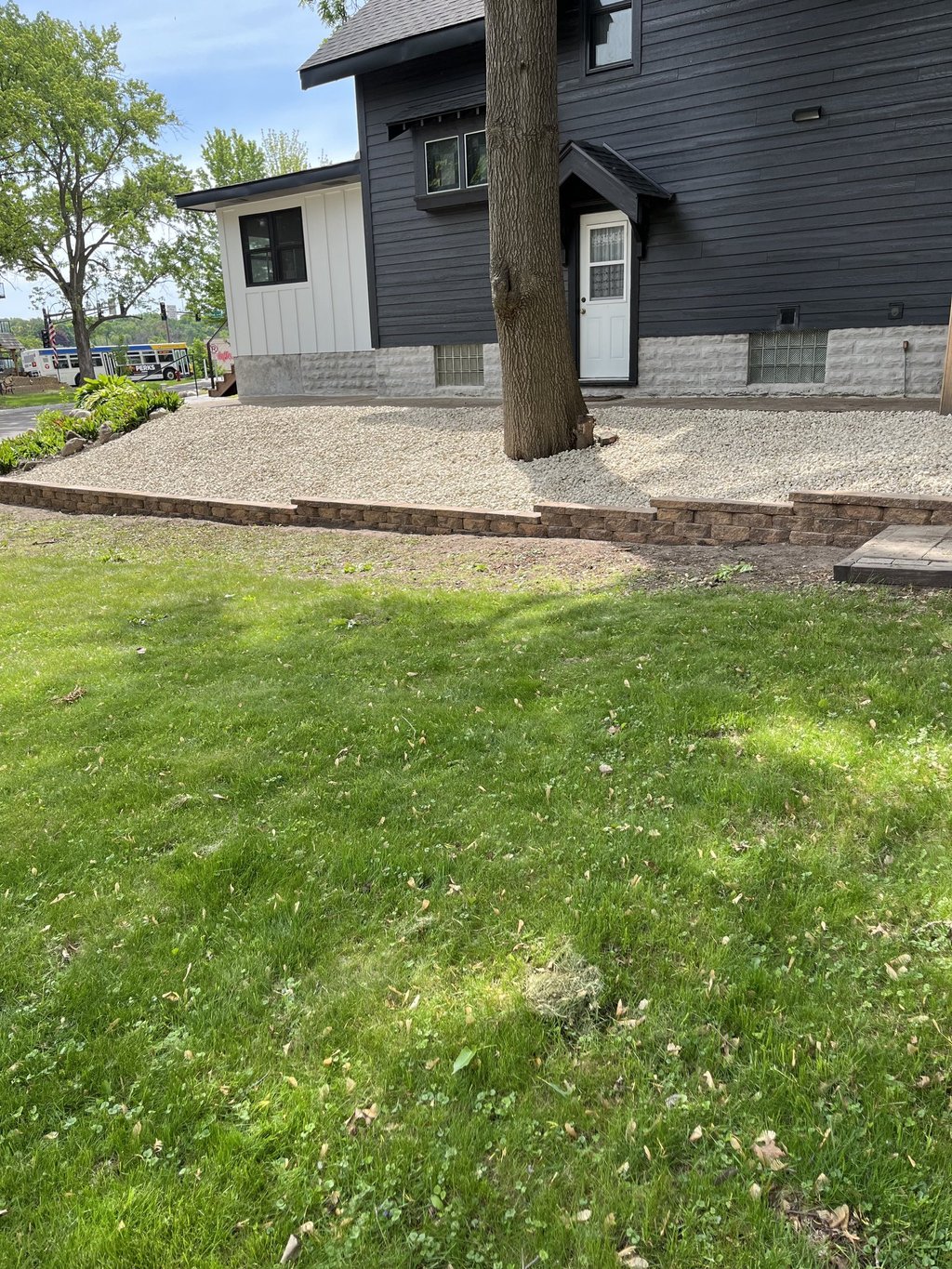 rock landscaping alongside residential driveway in central mn