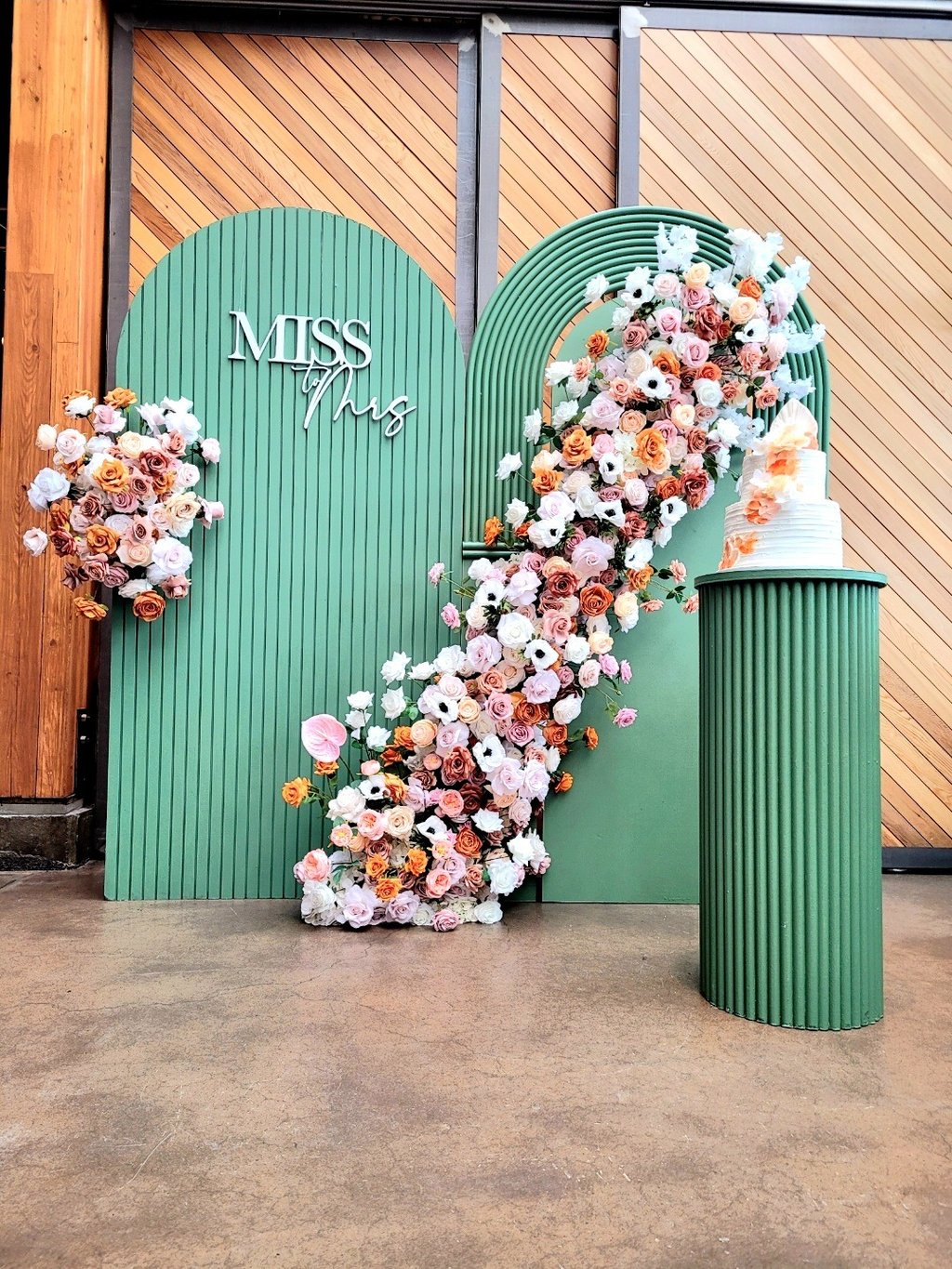Miss To Mrs bridal shower backdrop in green at a restaurant in Oakvile