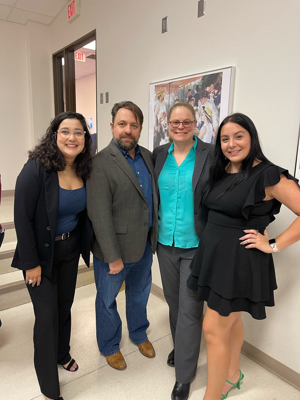 Dr. Hooton and Dr. Jason Pierce (center) with History Society leadership at their book launch event