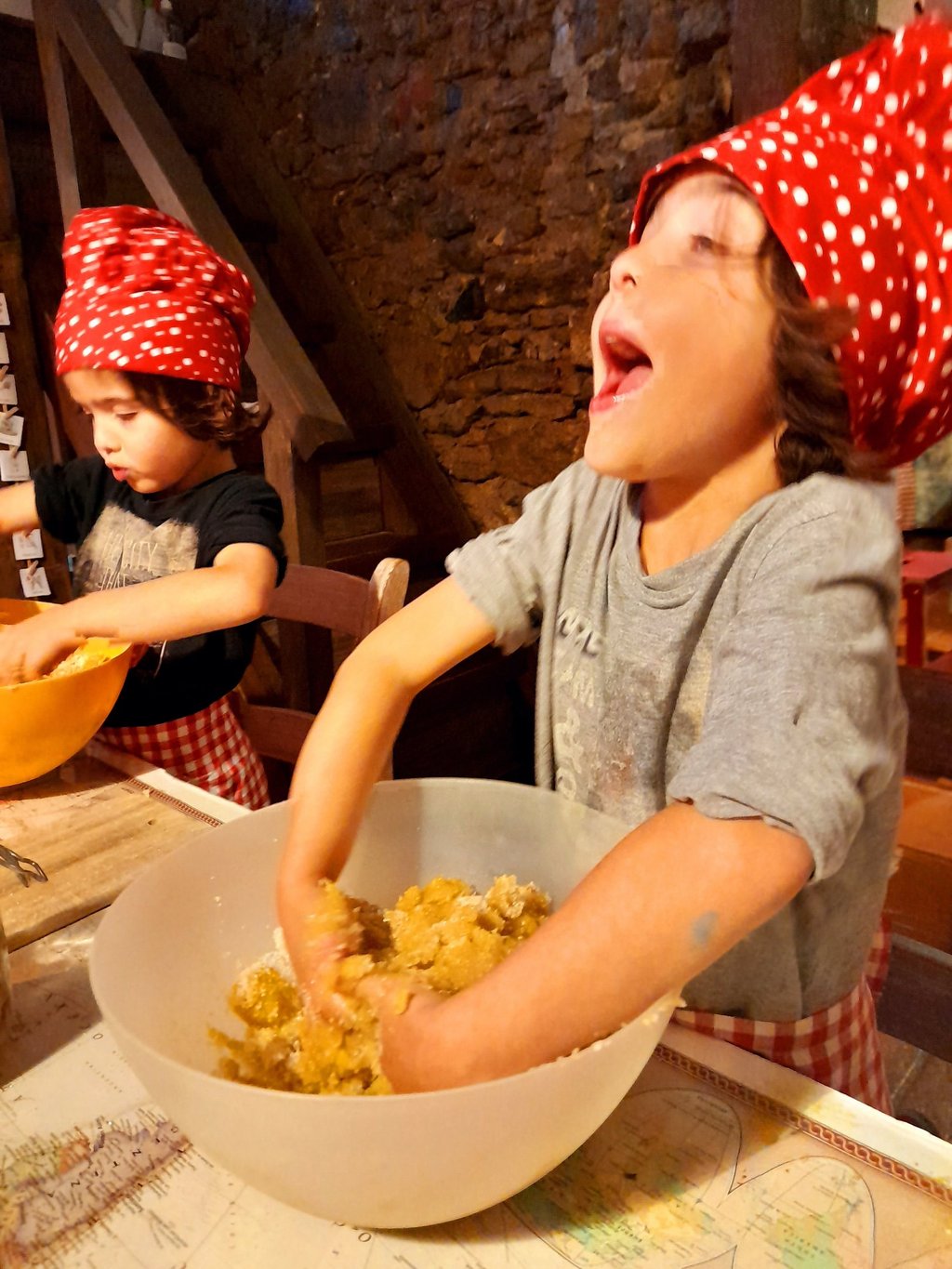 Children baking Christmas cookies in The Glass Room at Nature Dream Days