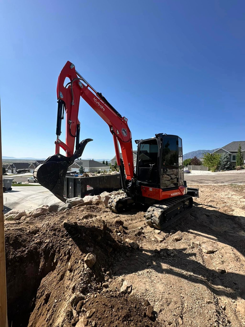 Kubota mini excavator digging dirt 