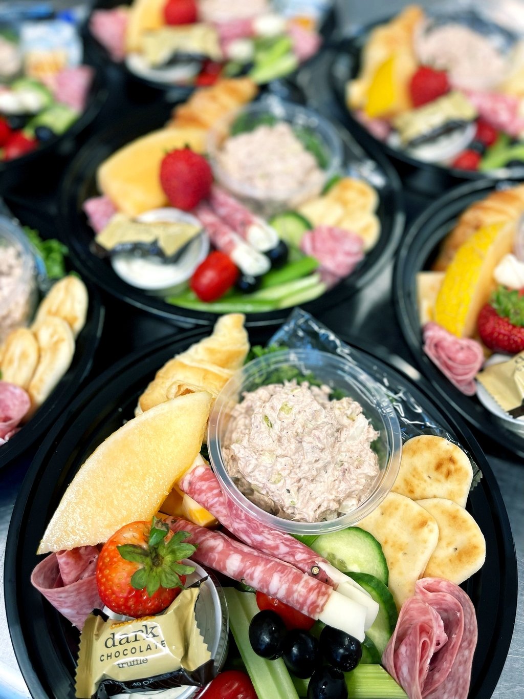 charcuterie lunch chicken salad veggies macaron