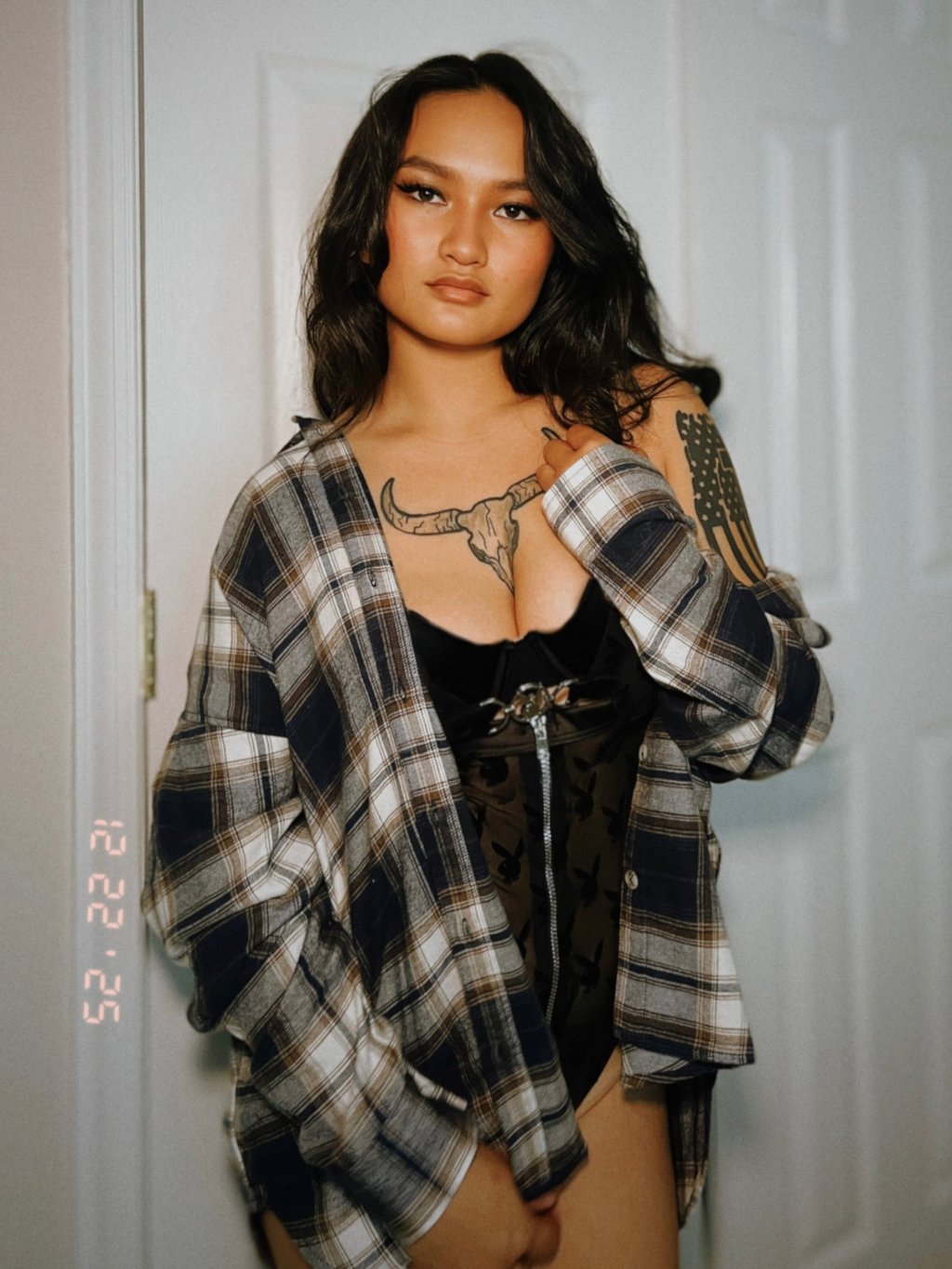 Amelia in a flannel and lace top