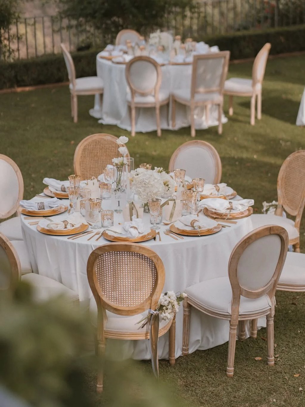 Outdoor round dining table set for garden reception
