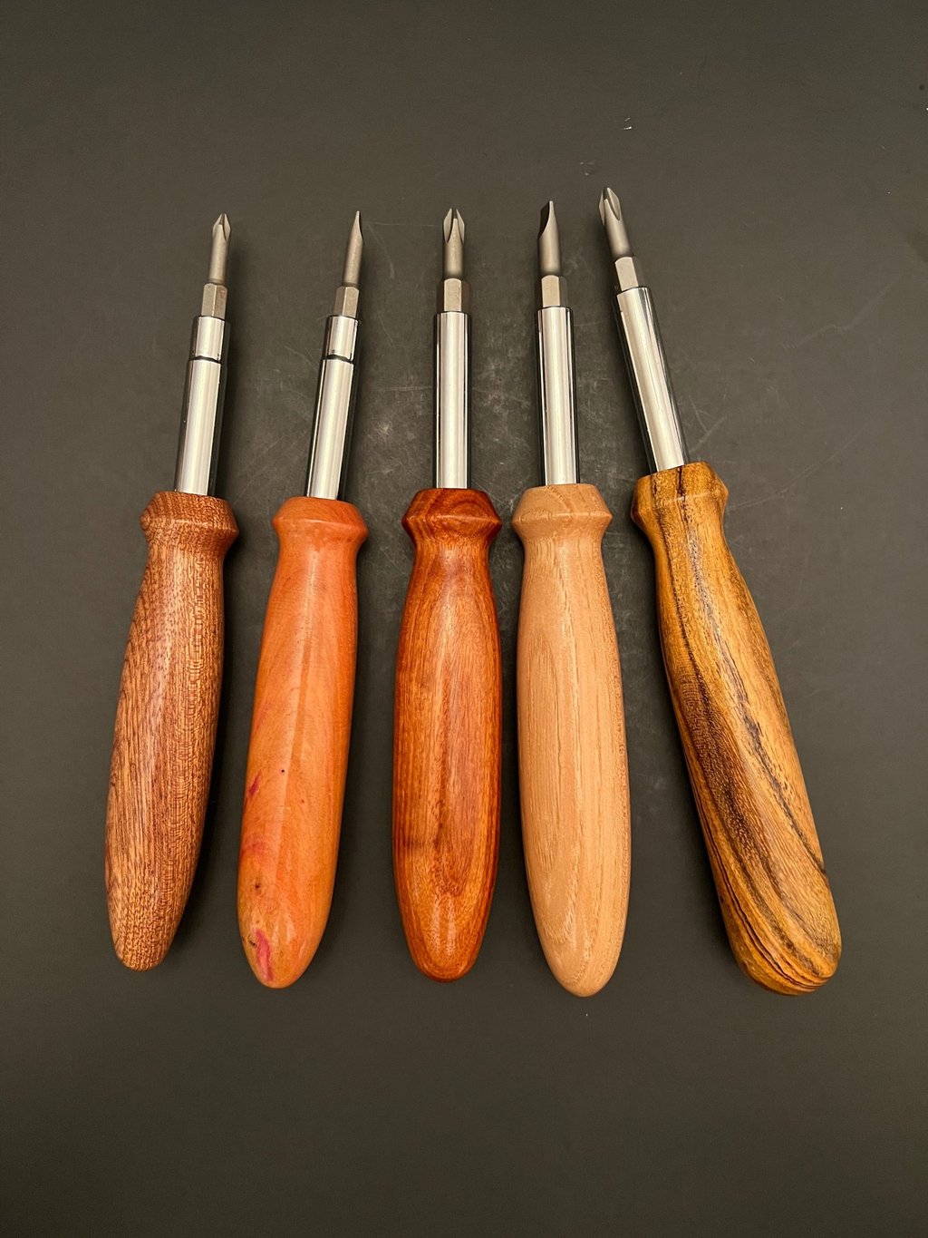 screwdrivers with various woods