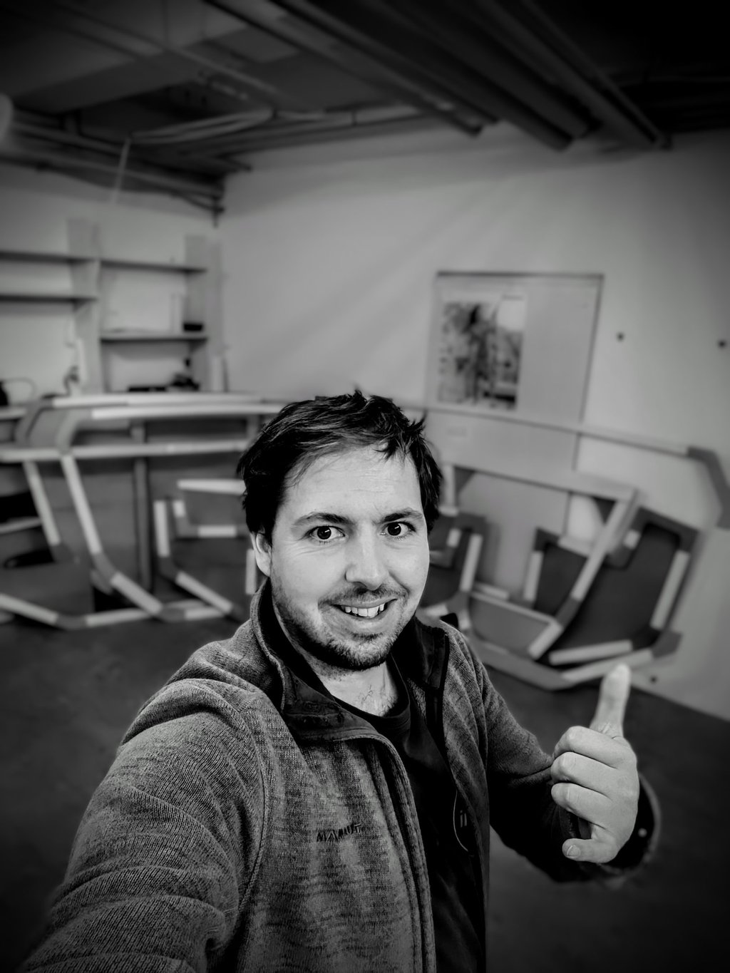 Portrait of Fabian Schmid Frames of Class GLobe 5.80 , Hull # 208 in the Background