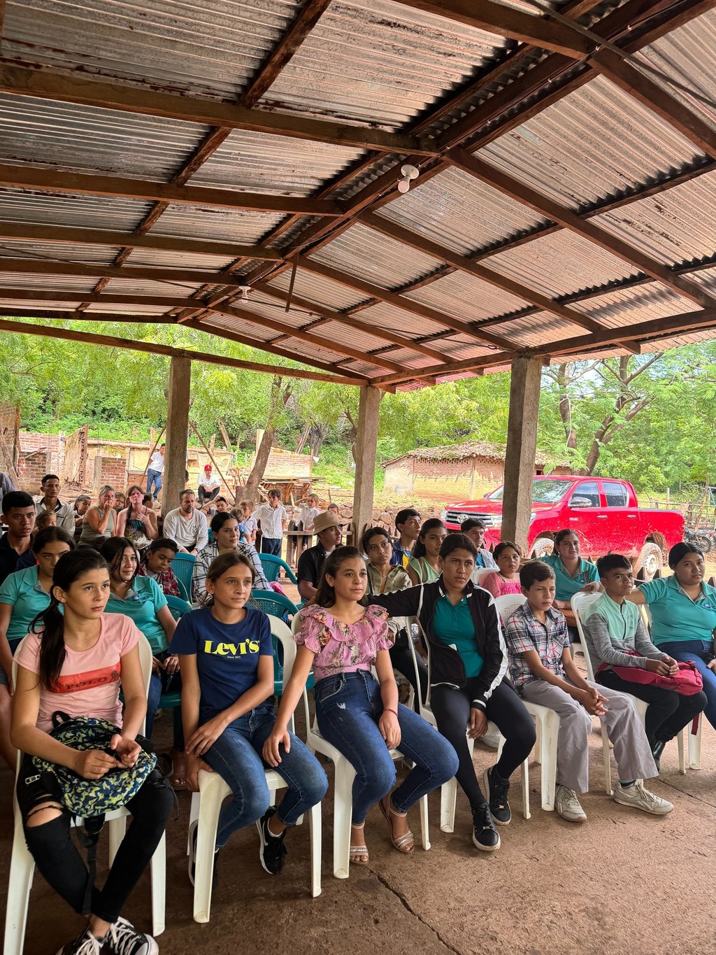 Students in Nicaragua sit together to hear testimonials.