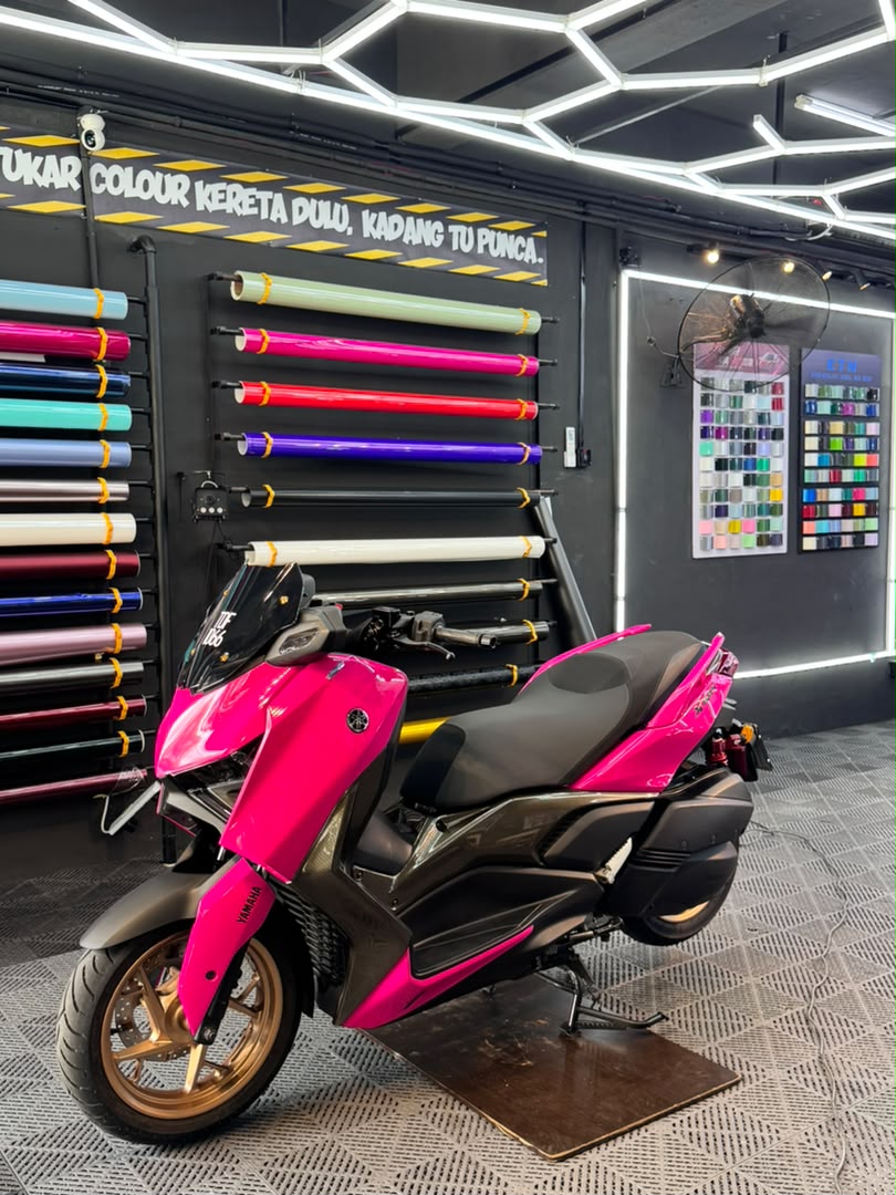 Yamaha XMAX scooter wrapped in gloss pink vinyl finish