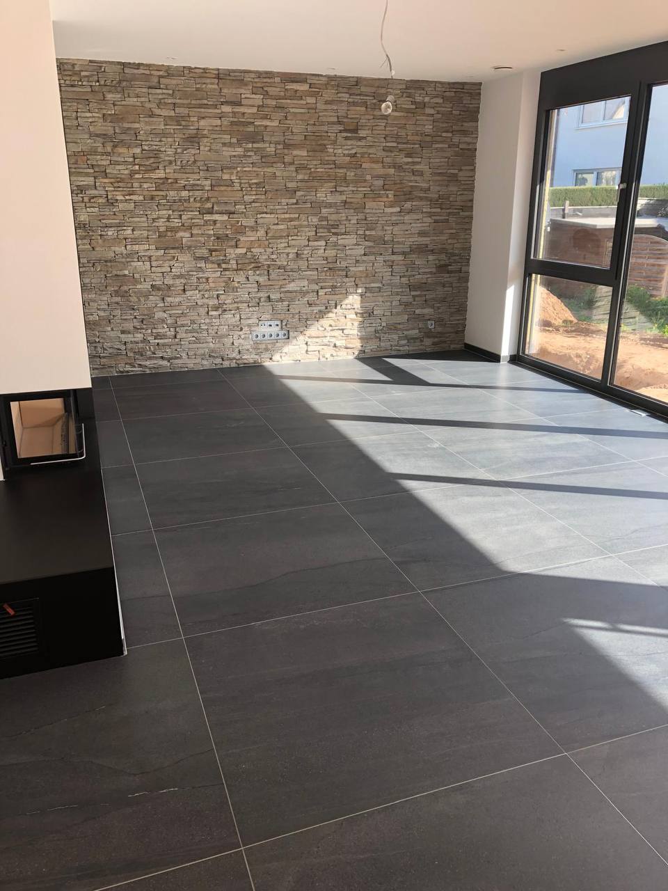 Fliesen und Naturstein in Wohnzimmer Aschaffenburg – Fliesenverlegung durch Kißenbeck