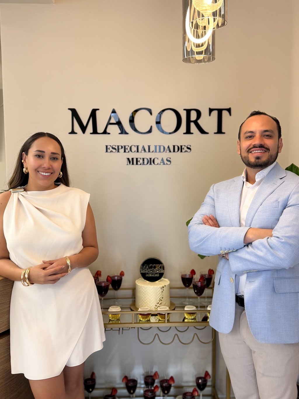 Medical professionals at Macort Especialidades Medicas clinic celebration.