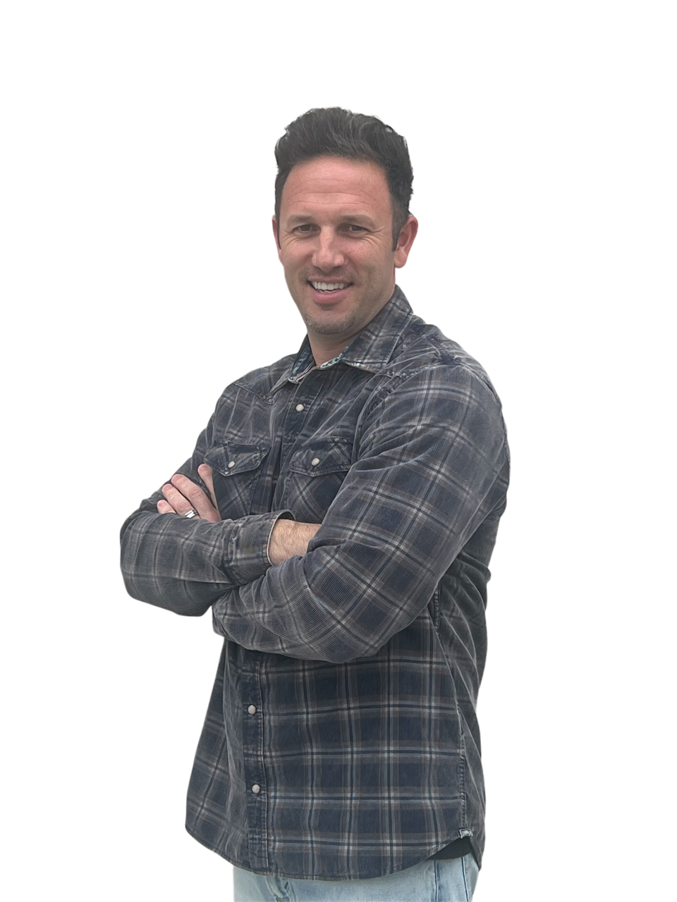 Smiling middle-aged man with short brown hair wearing a plaid button-down shirt posing with arms crossed.