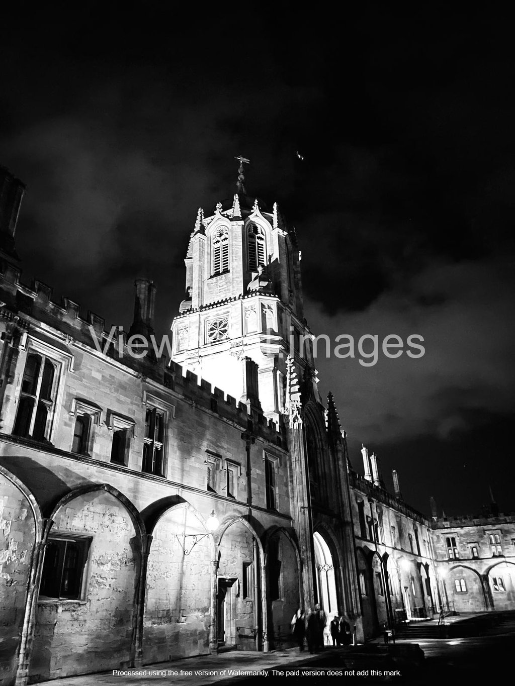 Black and white night view of Tom Tower and Christ Church College at Oxford University.