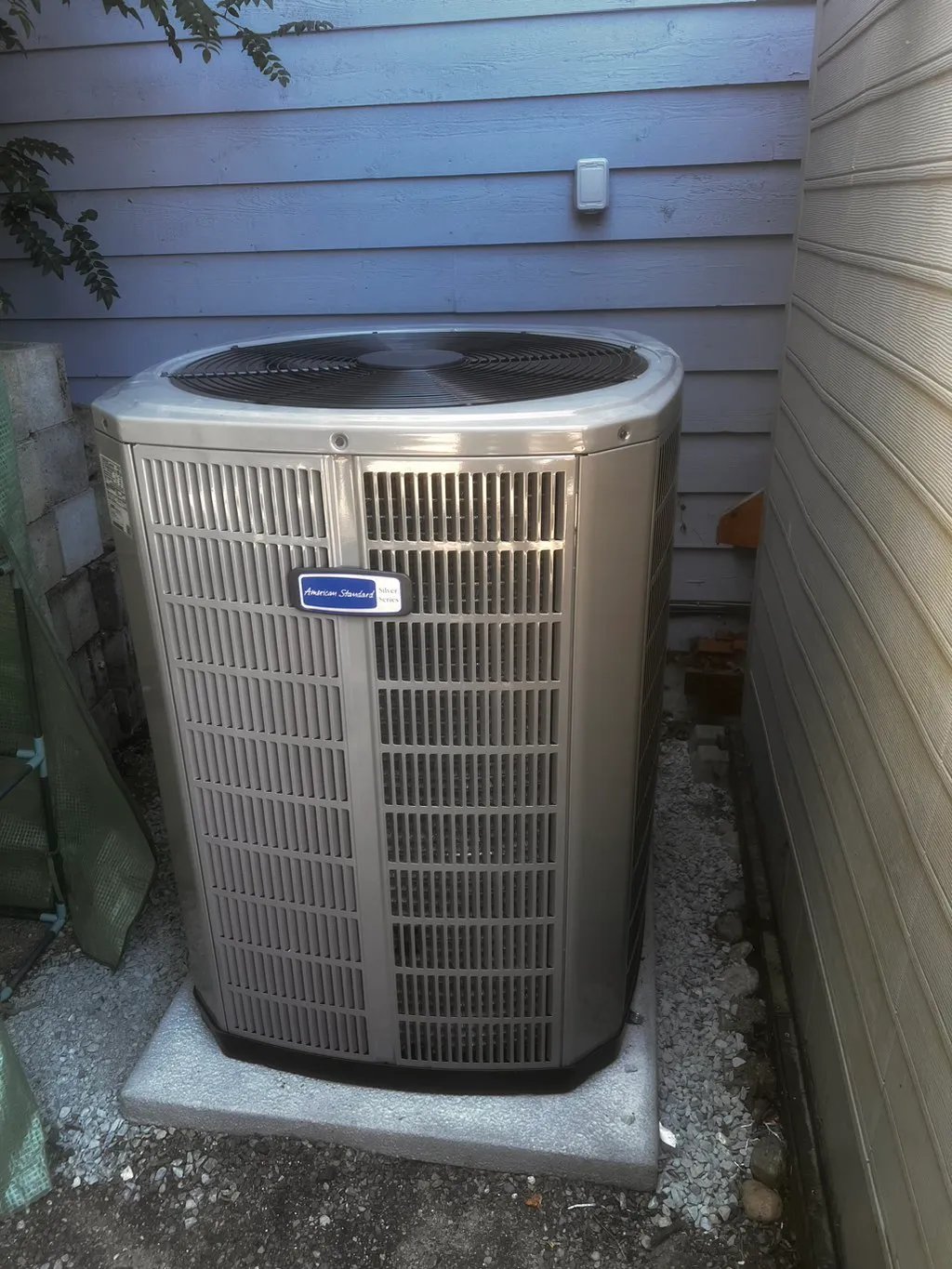 New Heat Pump American Standard installed outdoor nice and tidy area