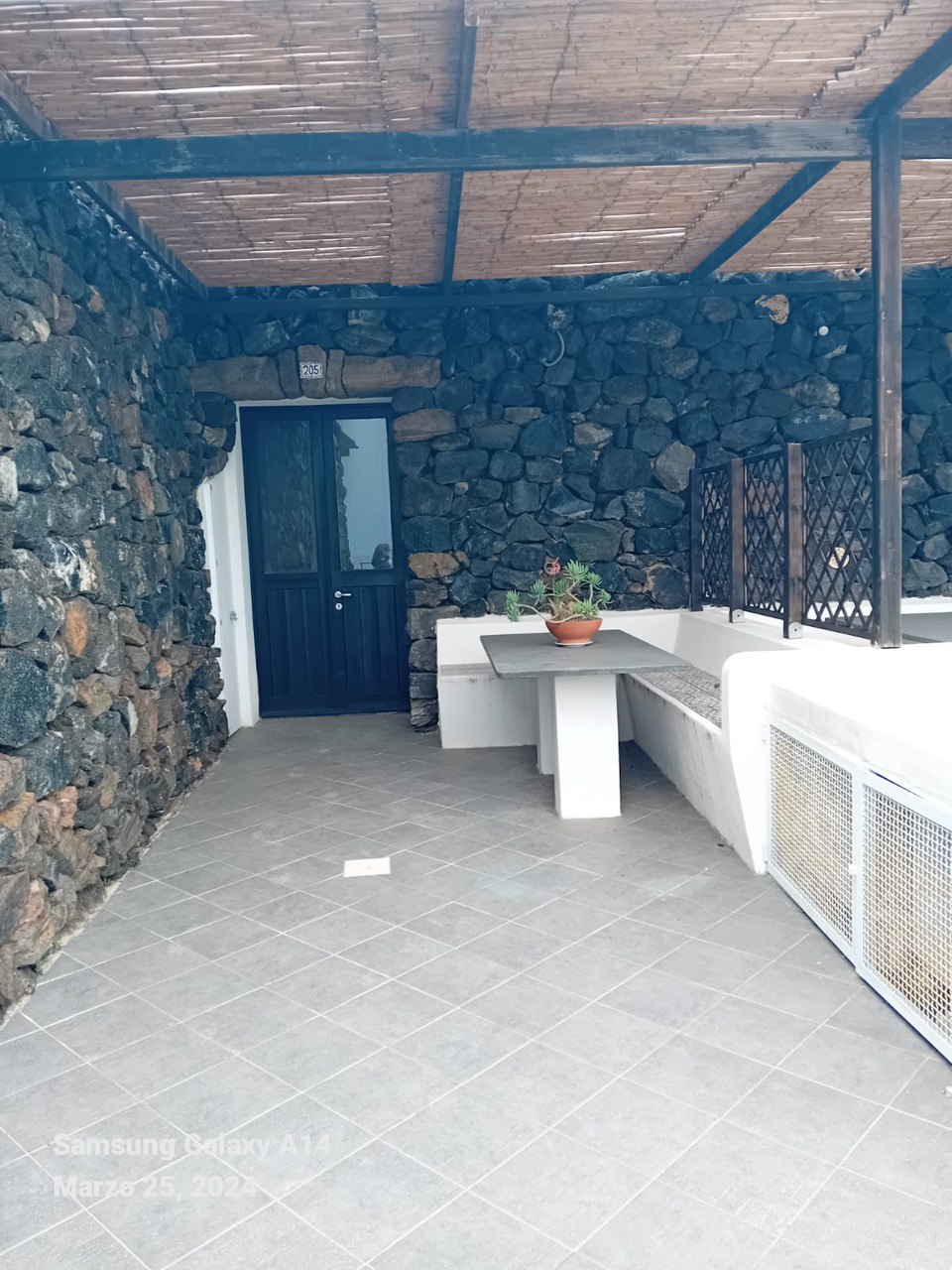 Dammuso in Sataria with stone walls near the Sataria caves