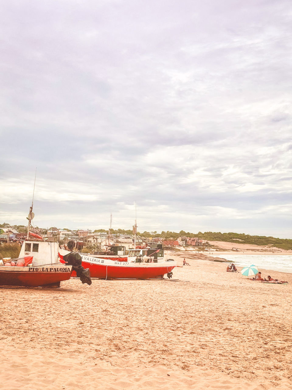 Boats on the beach in Punta Del Diablo in Uruguay