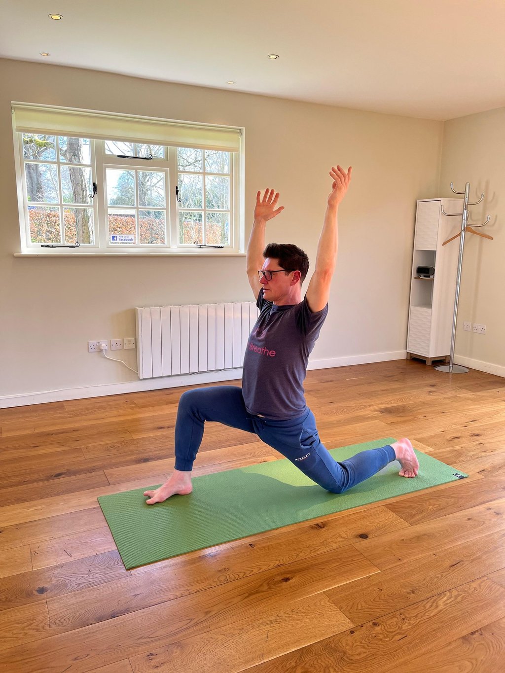 Yoga instructor Will stretch