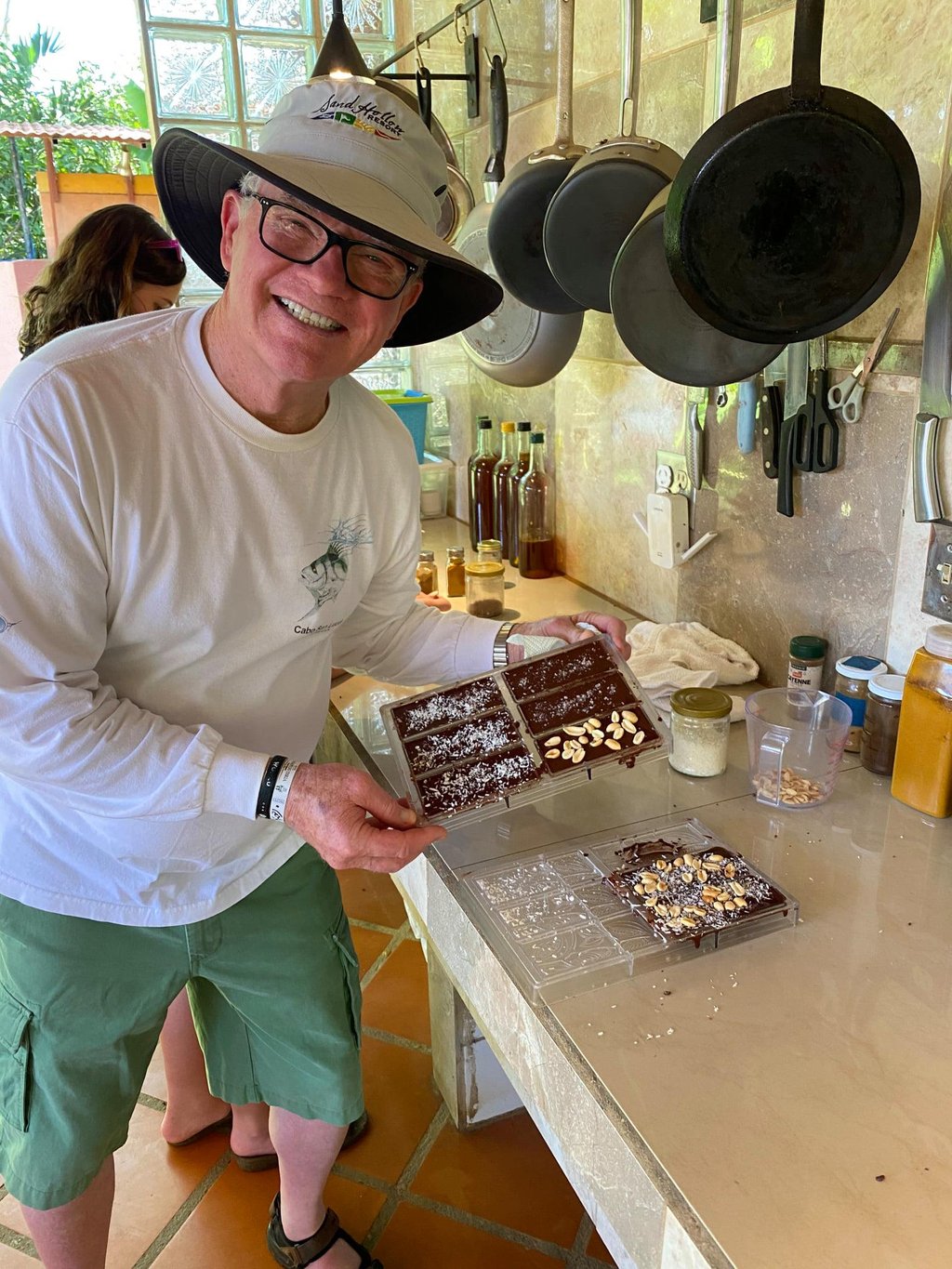 A Reina's Chocolate Master Class participant showing off his chocolate bars