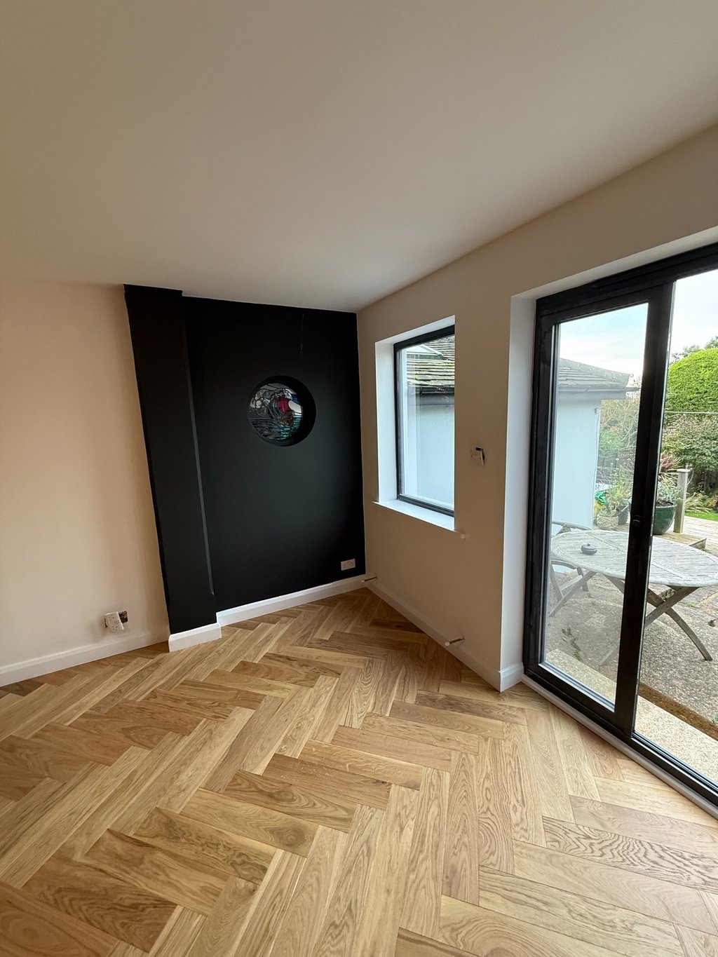 Herringbone wood flooring and feature wall in Worthing Sussex, modern interior finish