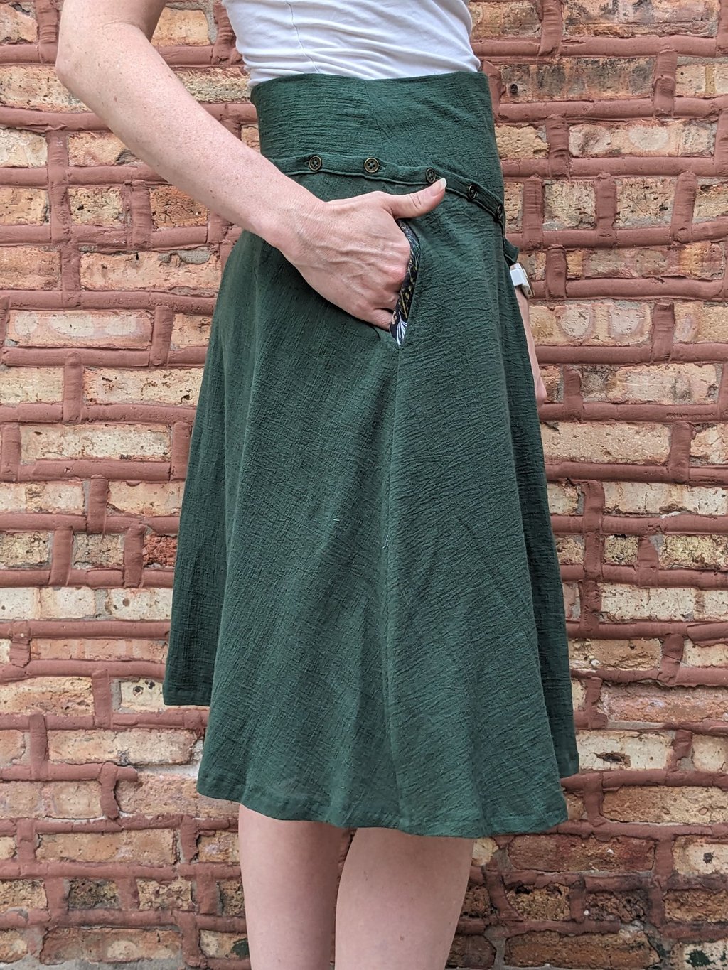 Knee length green skirt
