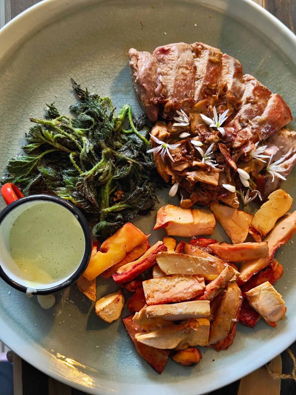 Pheasant breast with nettles, wild garlic mayo and chicken of the woods chips