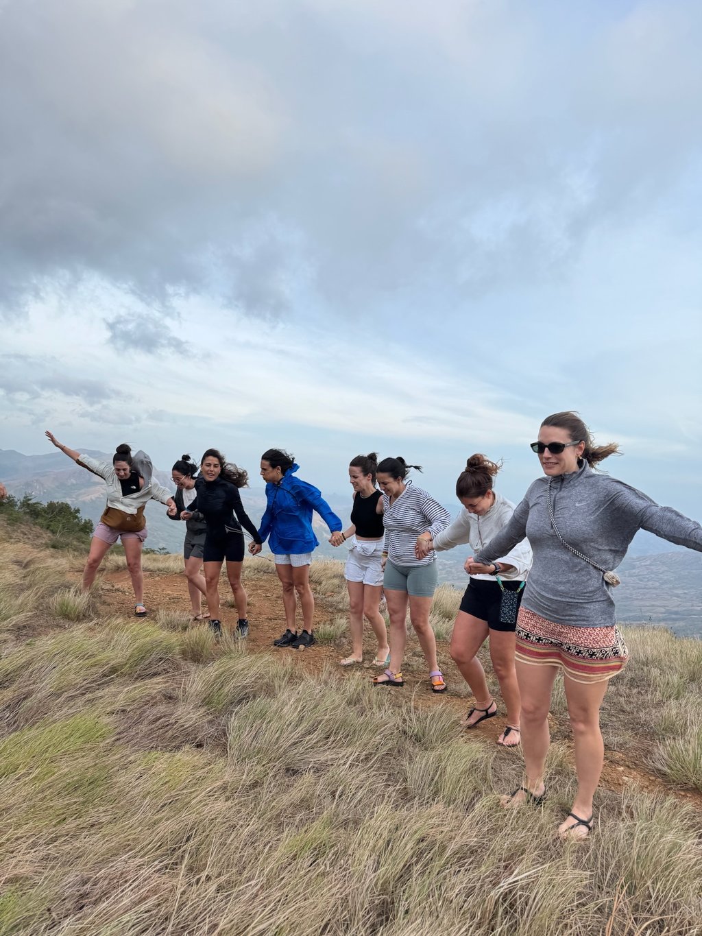 People enjoying mountain views and tropical scenery at Rainforest Yasmin Inn, Santa Fe, Panama.
