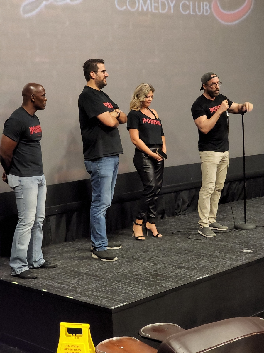 a group of people standing on a stage