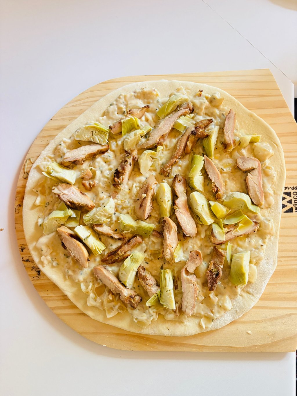 uncooked chicken artichoke pizza without cheese