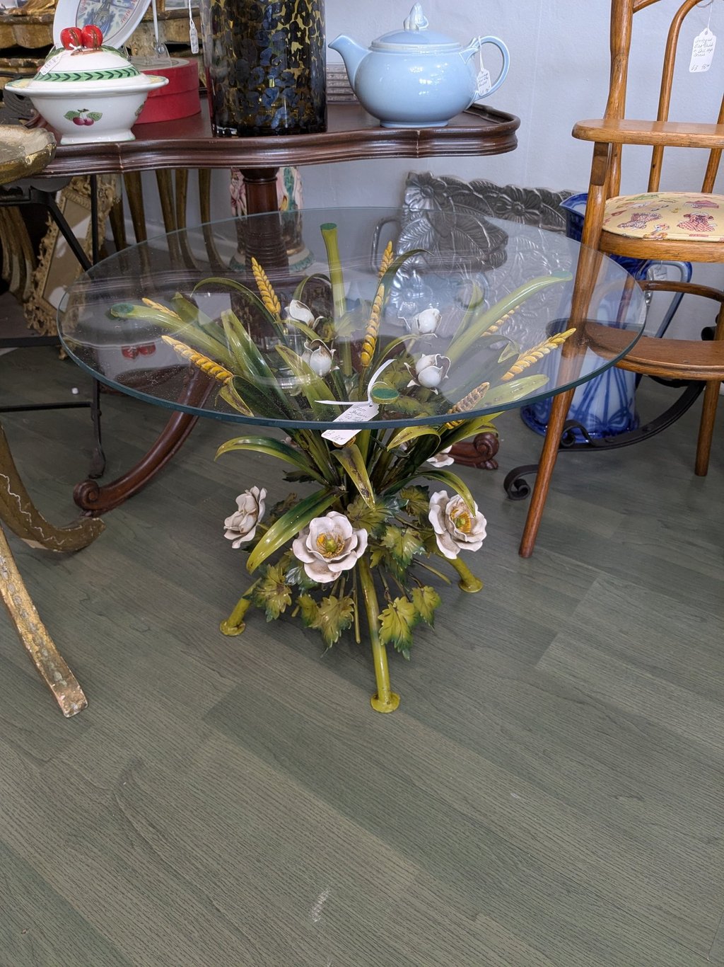 glass table with floral base