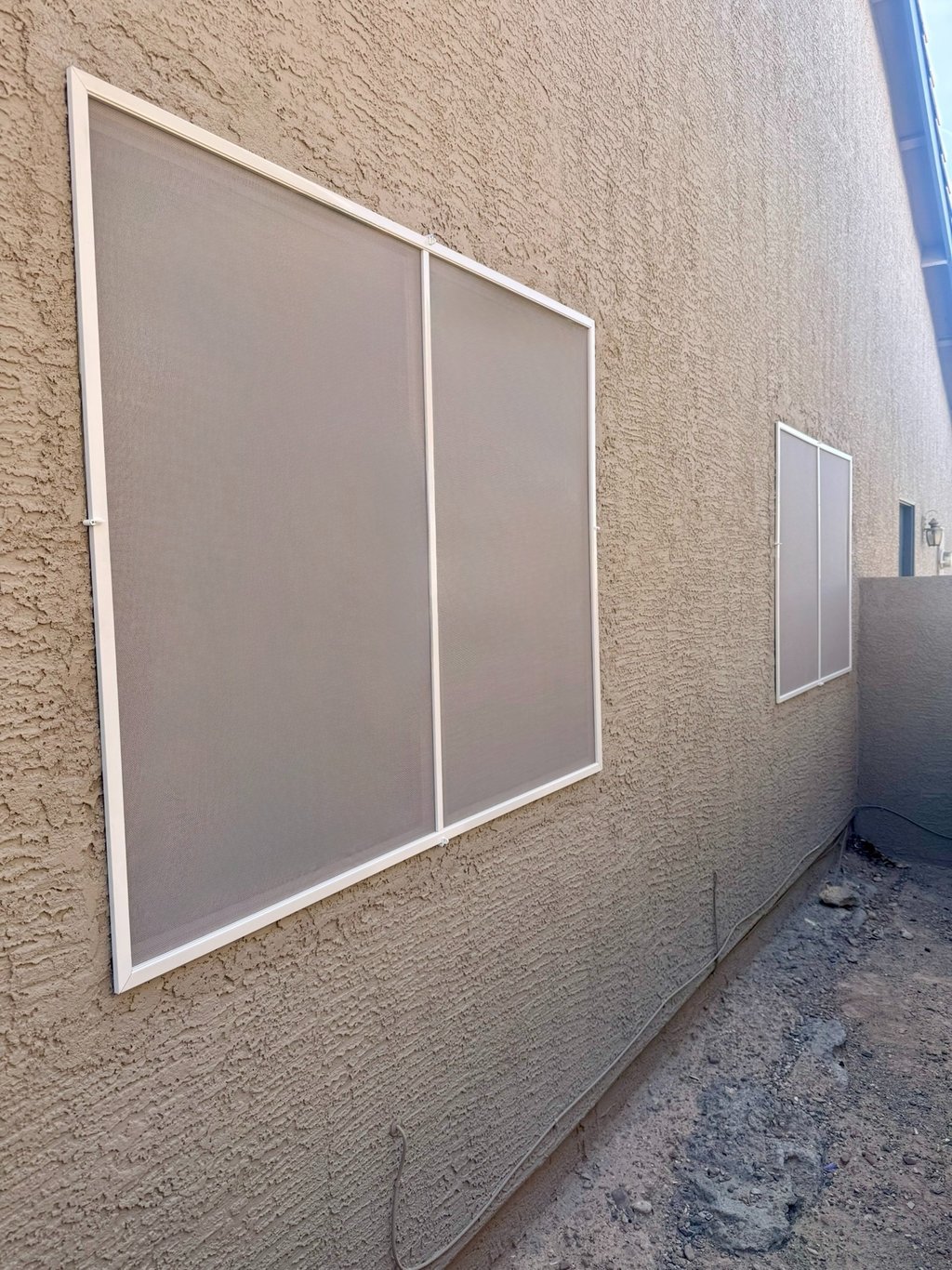 Newly fabricated and installed window screens provide privacy and protection