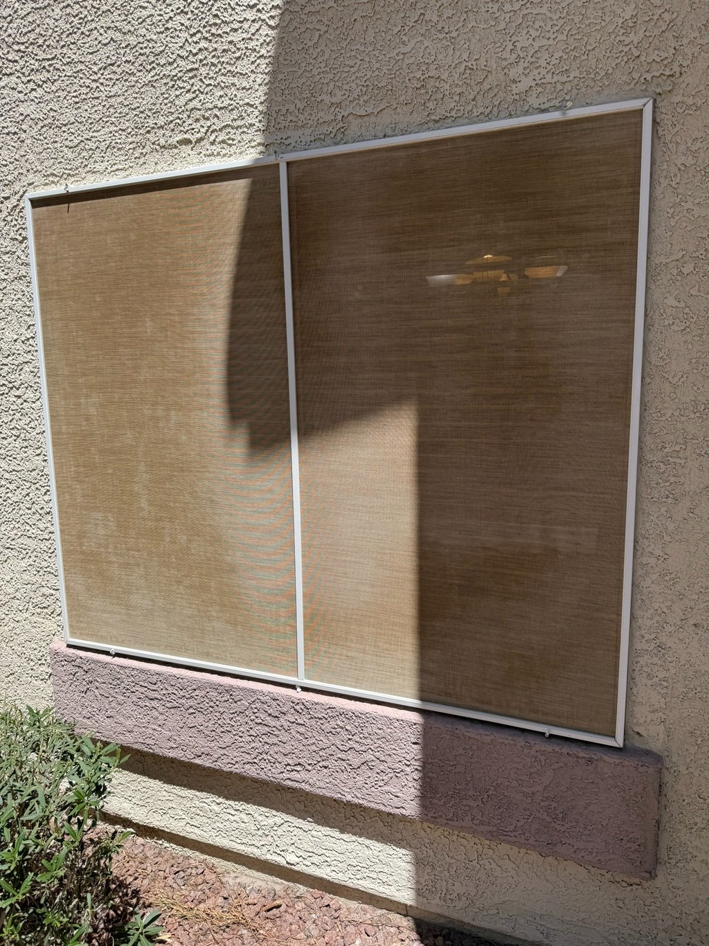 Old, dirty, faded, solar screen.