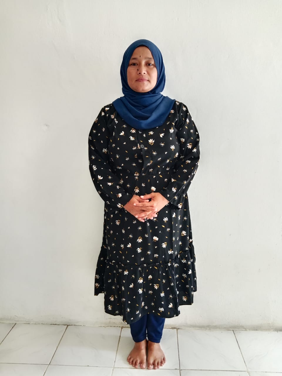 Mama Ario as caretaker of House of Hope