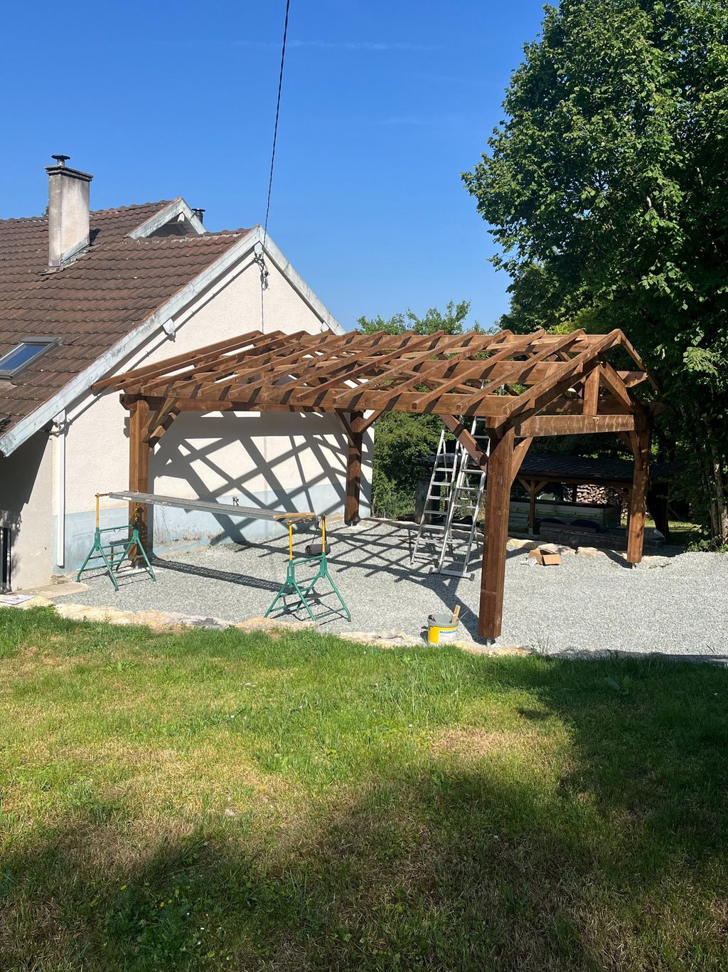 Abri de jardin à Hérimoncourt en bois traité autoclave marron.