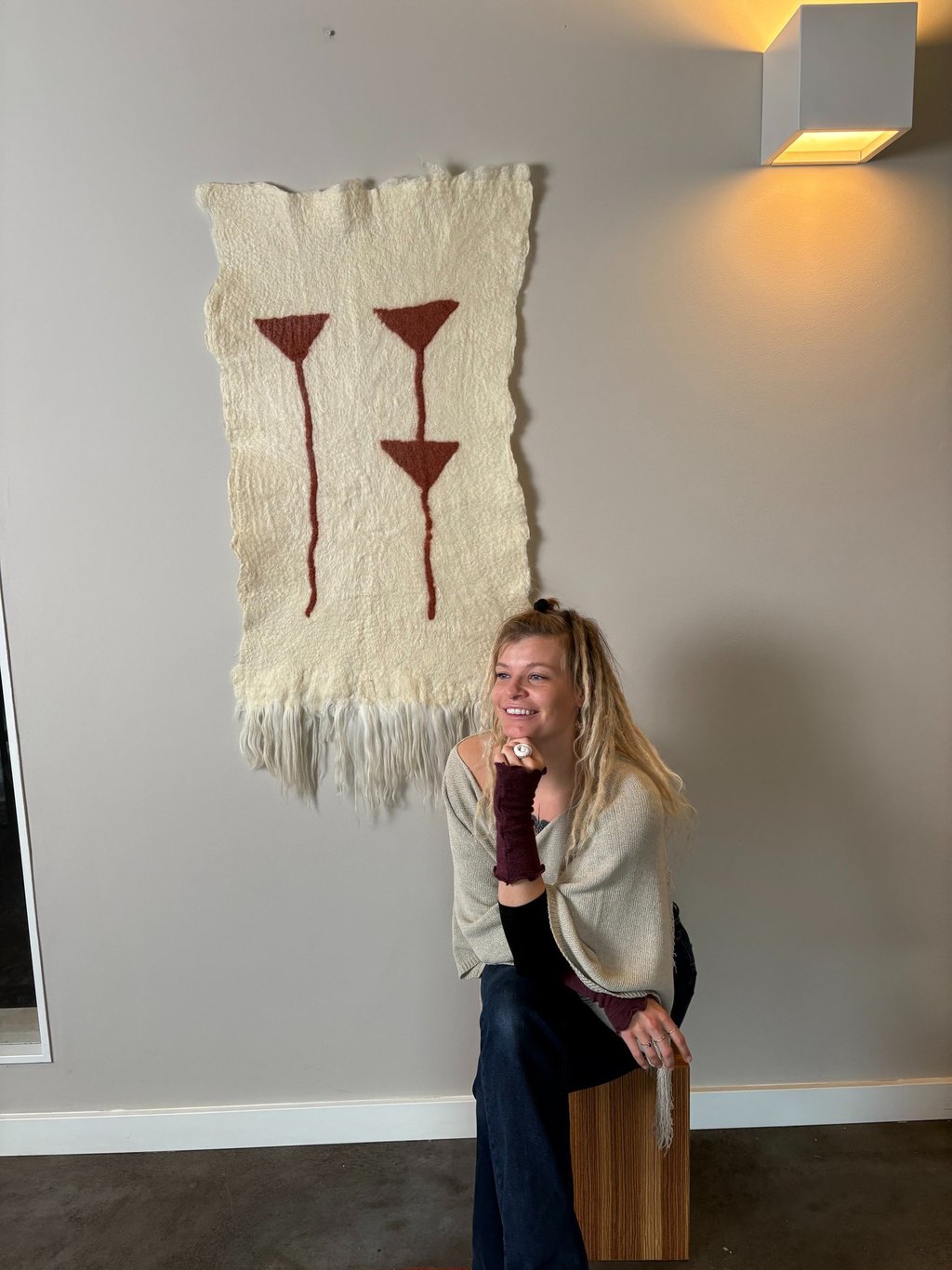 wool wall hanging felted tapestry women sitting on chair tribal pattern